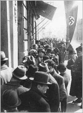 Jews wait in front of the Polish Embassy for entrance visas to Poland after Germany's annexation of Austria. Vienna, March or April 1938